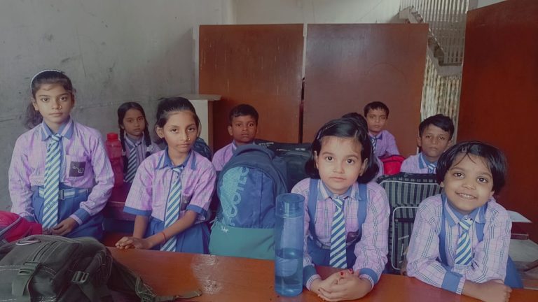 Happy school children posing for group photo